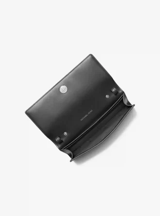 Duża, chropowata, skórzana torba typu crossbody Carson