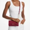Duża, chropowata, skórzana torba typu crossbody Carson