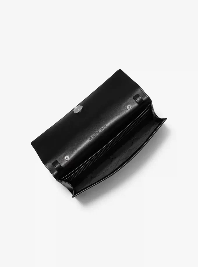 Duża torba typu crossbody Carson z nadrukiem w panterkę i sierścią cielęcą Duża torba typu crossbody Carson z nadrukiem w panterkę i sierścią cielęcą