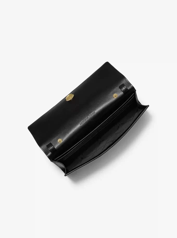 Duża torba typu crossbody Carson z nadrukiem w panterkę i sierścią cielęcą Duża torba typu crossbody Carson z nadrukiem w panterkę i sierścią cielęcą