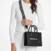 Mirella Mała, skórzana torebka typu crossbody z możliwością zmiany rozmiaru Mirella Mała, skórzana torebka typu crossbody z możliwością zmiany rozmiaru