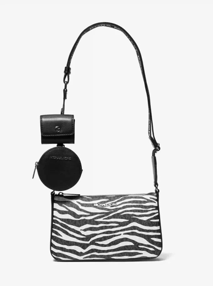 Średniej wielkości skórzana torba typu crossbody Jet Set z nadrukiem zwierzęcym i logo, z etui na Apple Airpods Pro® Średniej wielkości skórzana torba typu crossbody Jet Set z nadrukiem zwierzęcym i logo, z etui na Apple Airpods Pro®