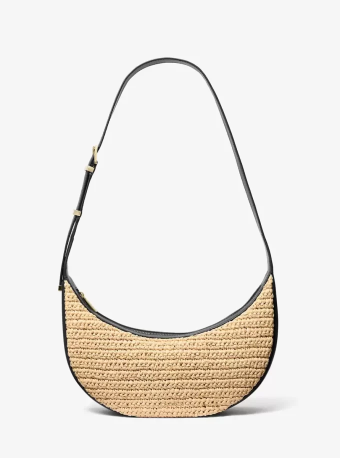 Średniej wielkości torebka Avra wykonana ręcznie na szydełku ze skóry i materiału typu crossbody Średniej wielkości torebka Avra wykonana ręcznie na szydełku ze skóry i materiału typu crossbody