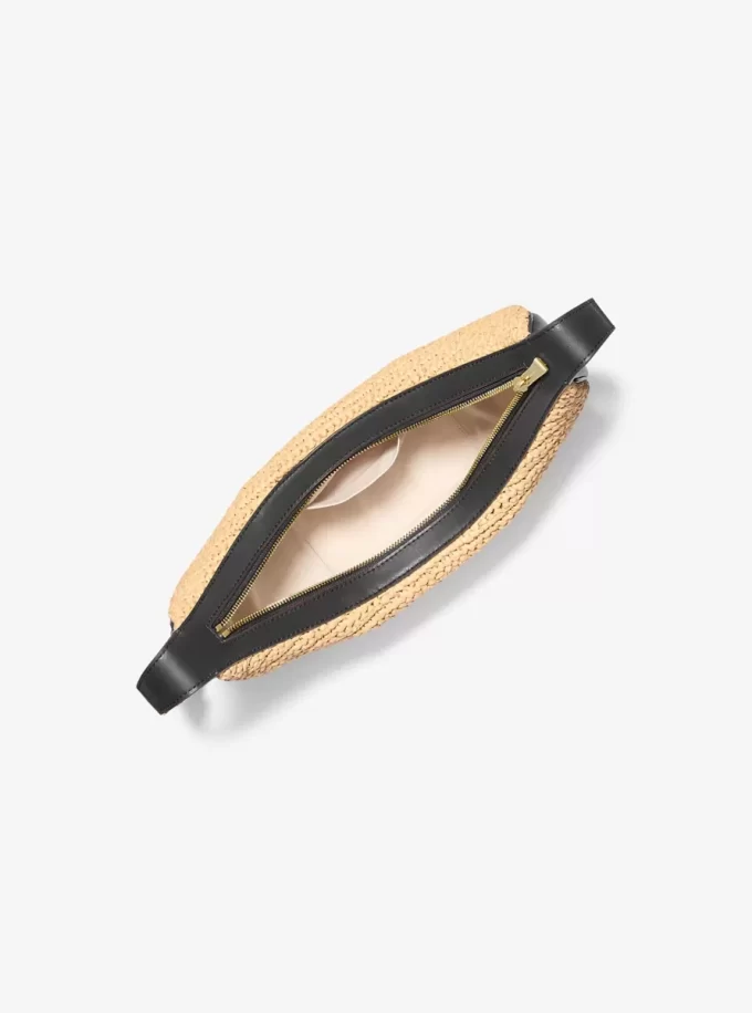 Średniej wielkości torebka Avra wykonana ręcznie na szydełku ze skóry i materiału typu crossbody Średniej wielkości torebka Avra wykonana ręcznie na szydełku ze skóry i materiału typu crossbody