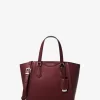 Taryn Mała skórzana torba typu crossbody z możliwością przekształcenia Taryn Mała skórzana torba typu crossbody z możliwością przekształcenia