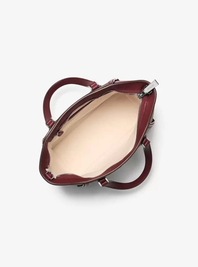Taryn Mała skórzana torba typu crossbody z możliwością przekształcenia Taryn Mała skórzana torba typu crossbody z możliwością przekształcenia