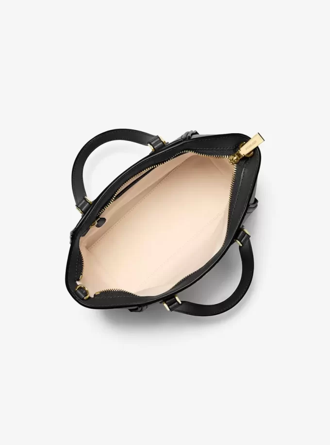 Taryn Mała skórzana torba typu crossbody z możliwością przekształcenia Taryn Mała skórzana torba typu crossbody z możliwością przekształcenia