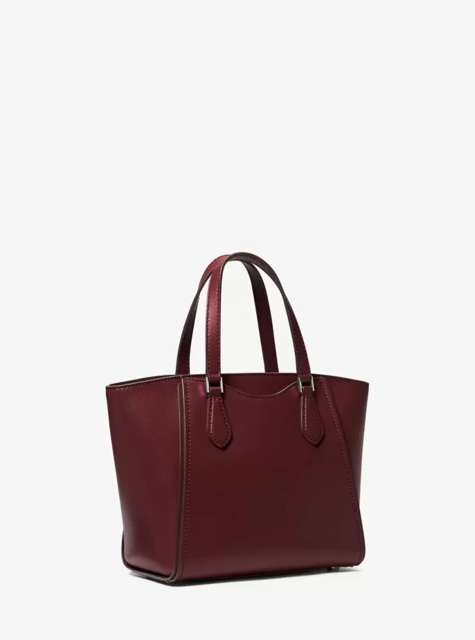Taryn Mała skórzana torba typu crossbody z możliwością przekształcenia Taryn Mała skórzana torba typu crossbody z możliwością przekształcenia