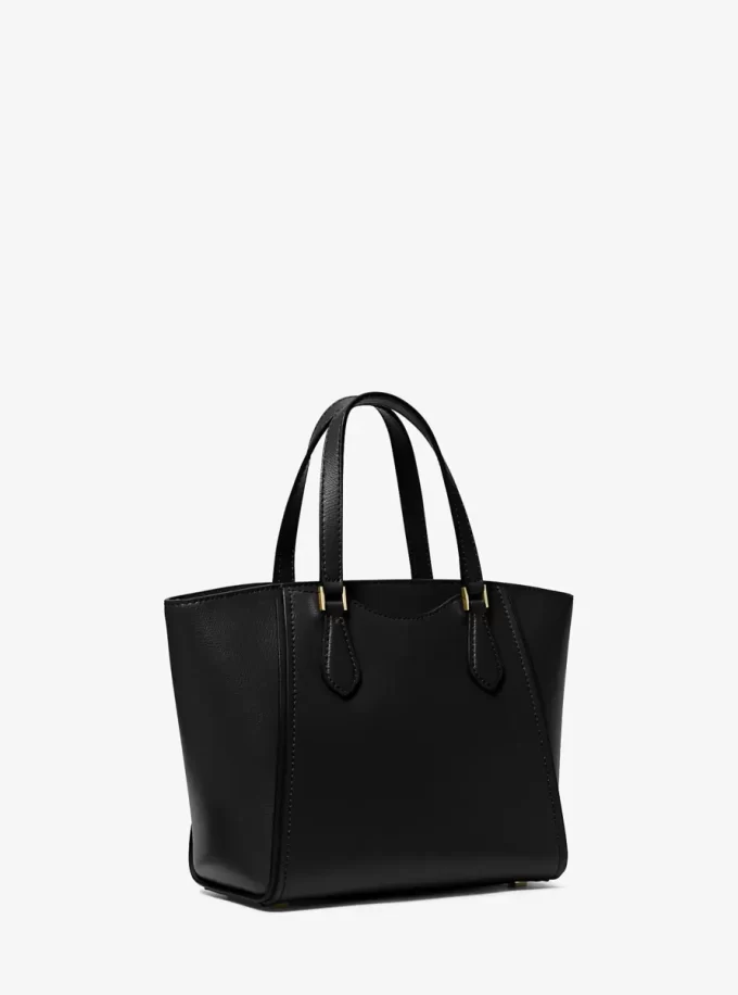 Taryn Mała skórzana torba typu crossbody z możliwością przekształcenia Taryn Mała skórzana torba typu crossbody z możliwością przekształcenia