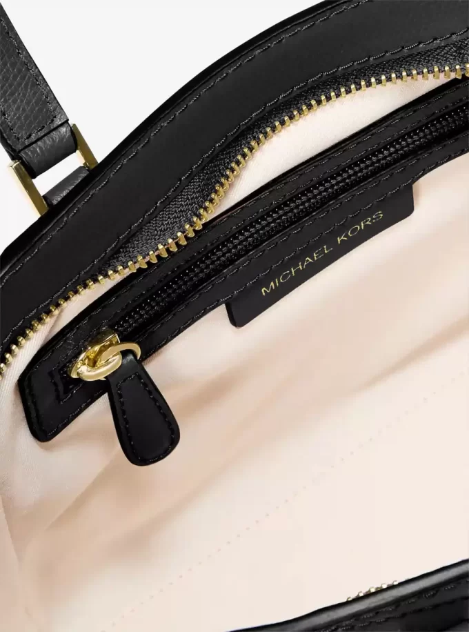 Taryn Mała skórzana torba typu crossbody z możliwością przekształcenia Taryn Mała skórzana torba typu crossbody z możliwością przekształcenia